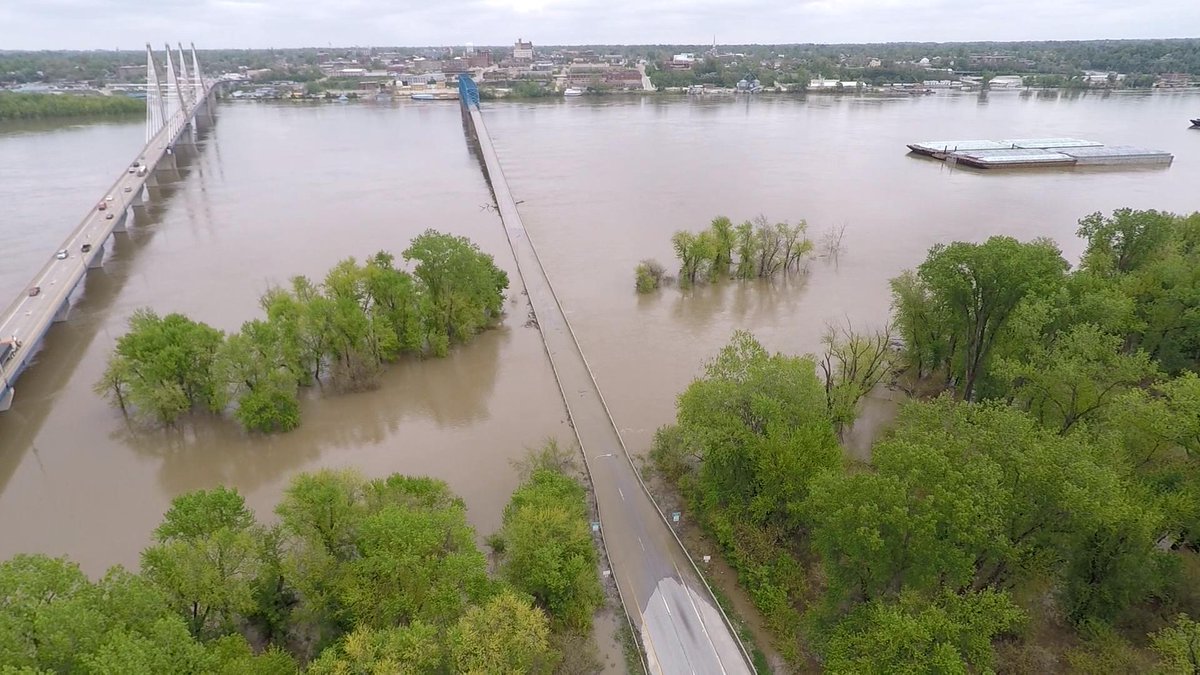 Flood waters from the Mississippi River covering both lanes of Memorial Bridge in Quincy, IL