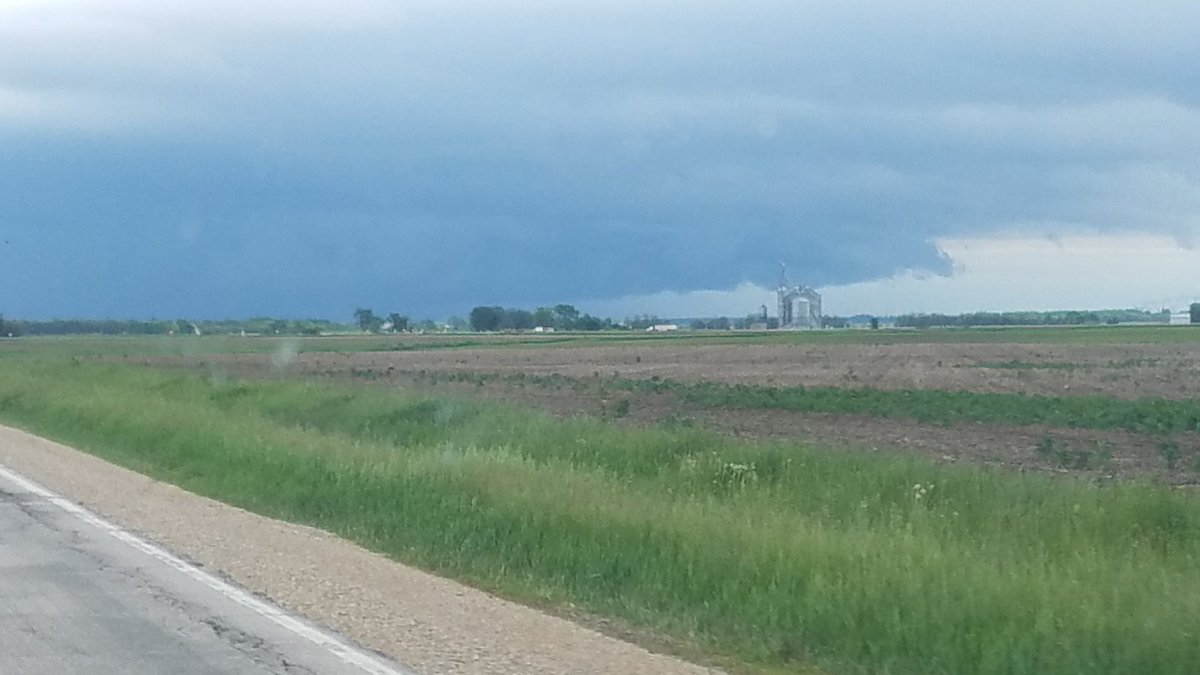 Wall cloud on Tornado warned cell near Joliet.