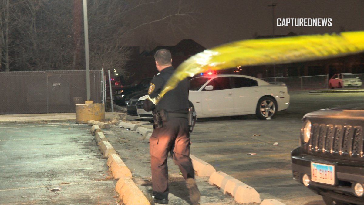 Lansing, IL: Police investigate a shooting at Hooters in the 17000 Block of Torrence Avenue late Thursday night. Crime scene tape and shell casings covered the parking lot.