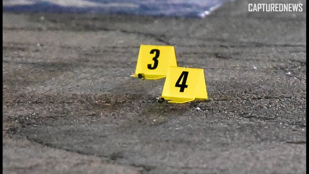 Lansing, IL: Police investigate a shooting at Hooters in the 17000 Block of Torrence Avenue late Thursday night. Crime scene tape and shell casings covered the parking lot.