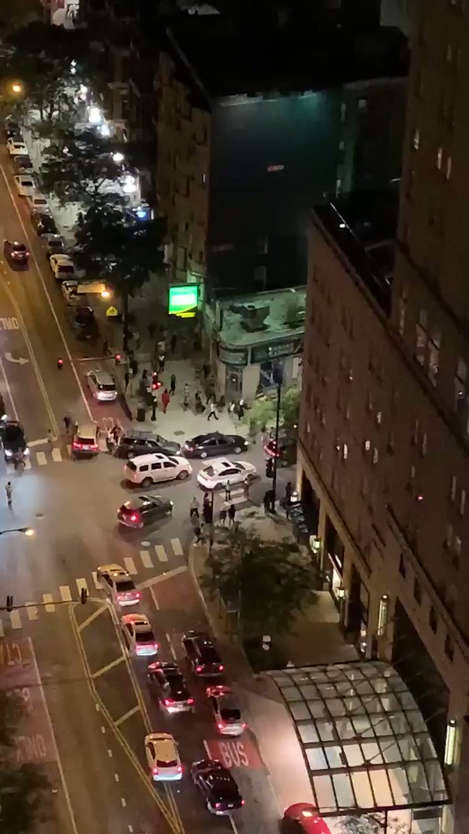 Looting some stores. Police on the street with riots in Chicago