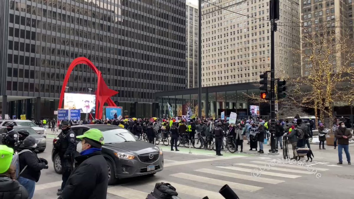 Chicago Police are now separating opposing protests across Dearborn Street at today's March for Life