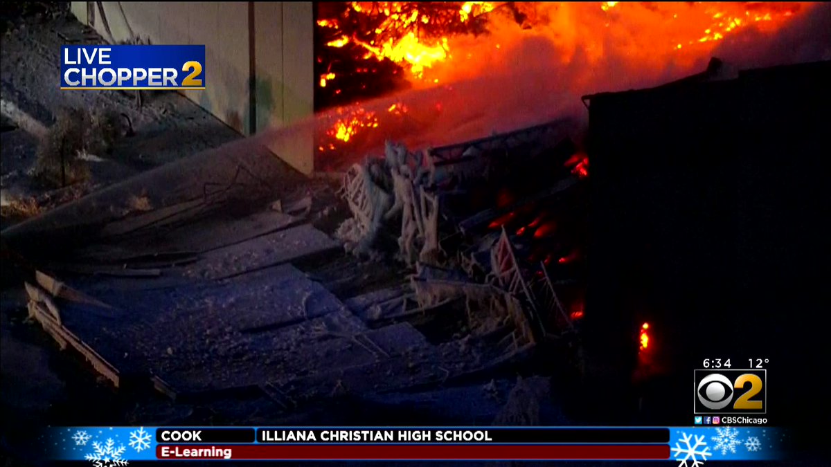 water freezing while firefighters battle this massive fire in Bartlett.