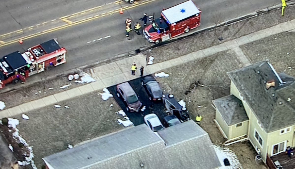 DownersGrove - Northbound lanes if Main St are blocked just north of Ogden because of a rollover crash. Car lost control, went across the grass and landed on its side in a driveway