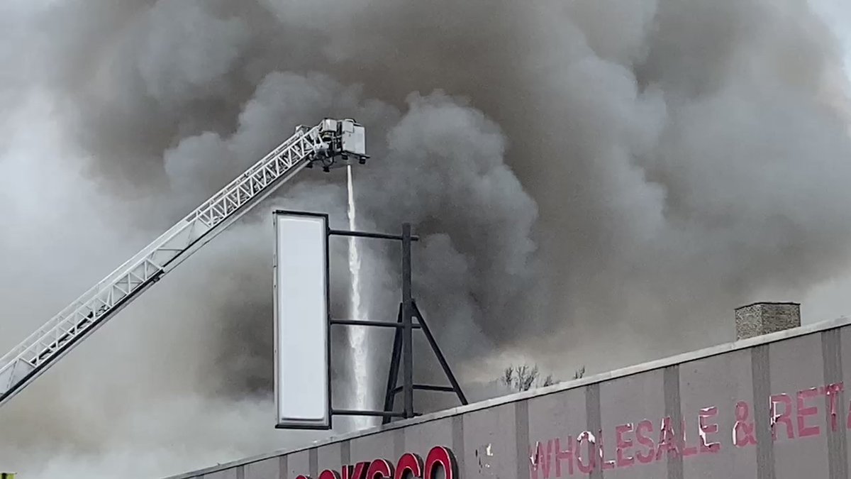 The trusowstring roof collapsed, forcing firefighters to douse flames from above