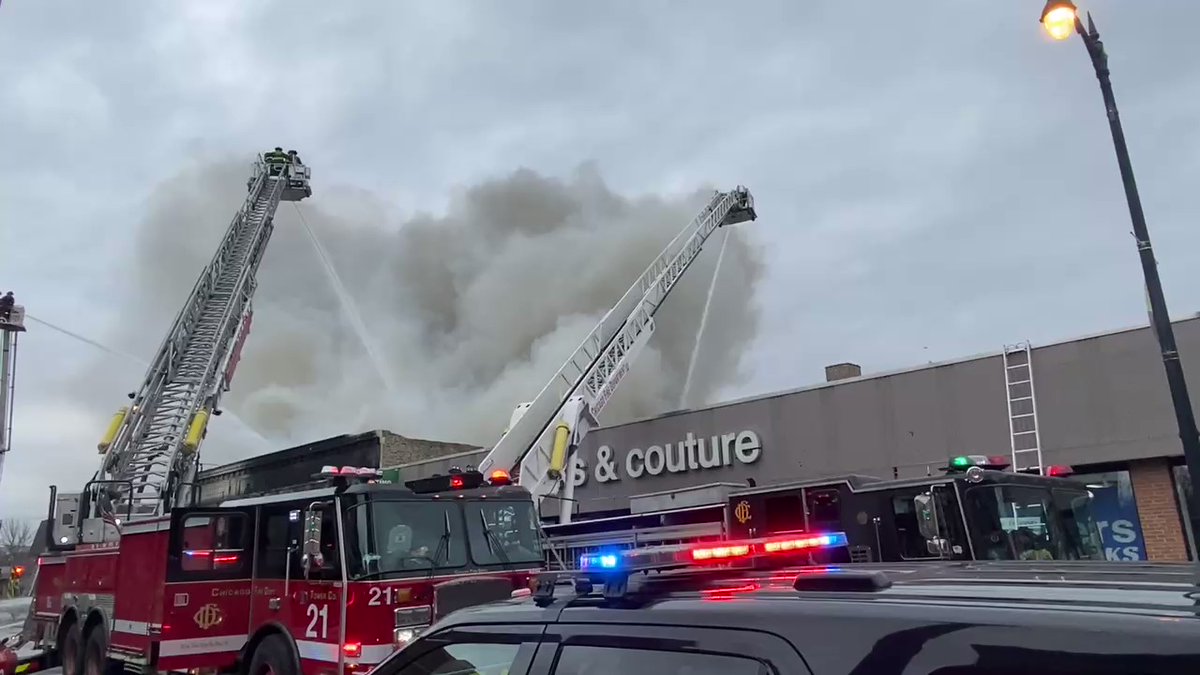 Firefighters continue to douse flames at 3041 W. Lawrence. in Albany Park