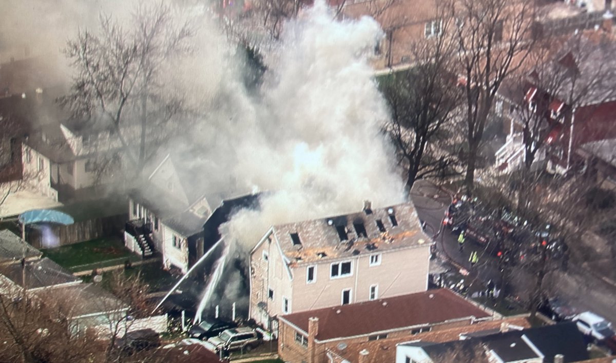 Chicago Lawn - fire has spread to 3 homes on Bell between 67th & 68th