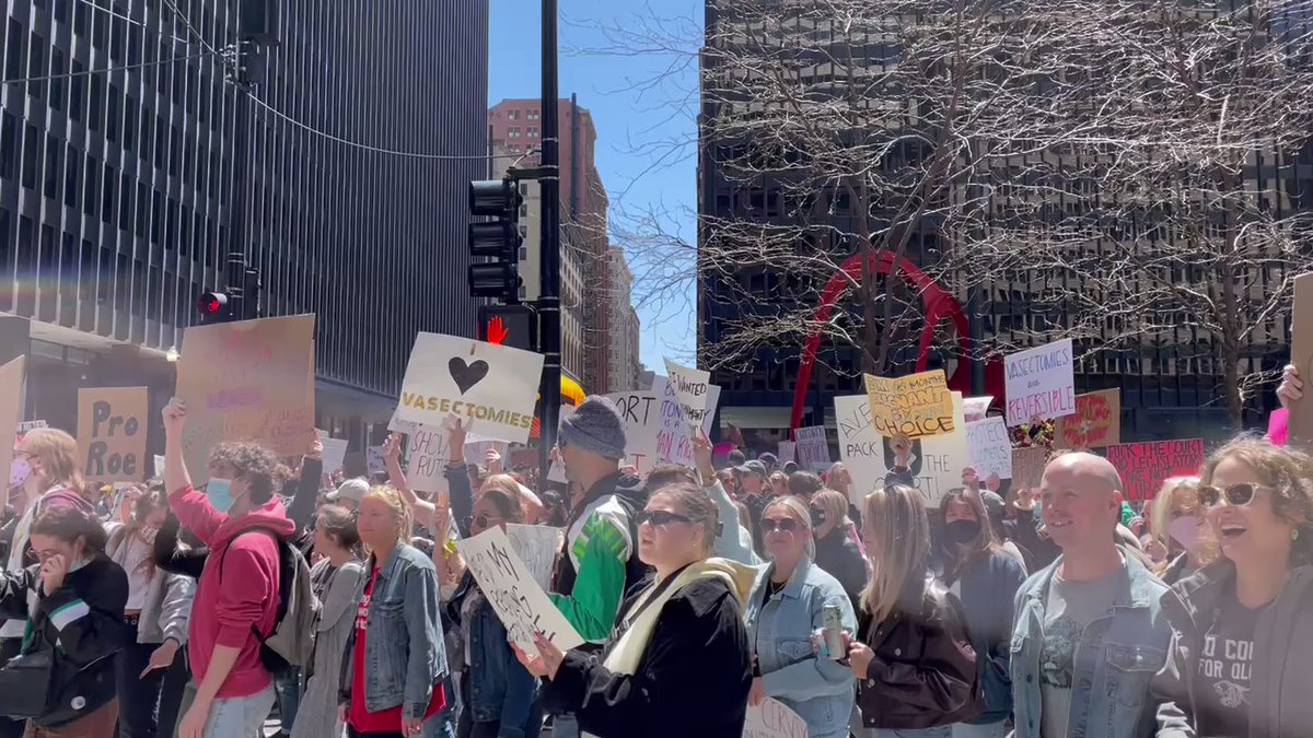 The crowd has begun marching. You can hear some slight tension between protestors and counter-protestors in this clip