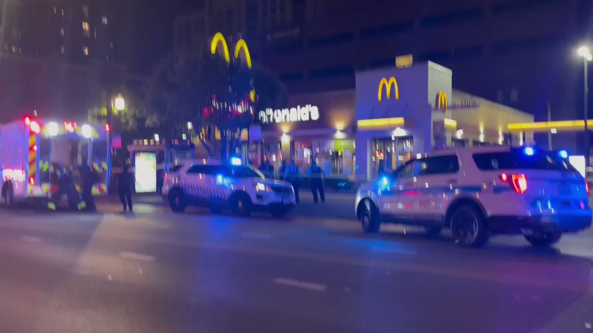 The scene where at least one person has been wounded by gunfire near the intersection of Chicago and State