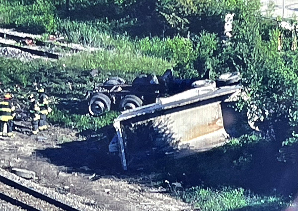 Milwaukee North Line train 2116 sits partly derailed after striking a 5 axle dump truck at a private crossing just south of Route 120 in Grayslake. No word yet on injuries to the truck driver or anyone aboard the train. s at