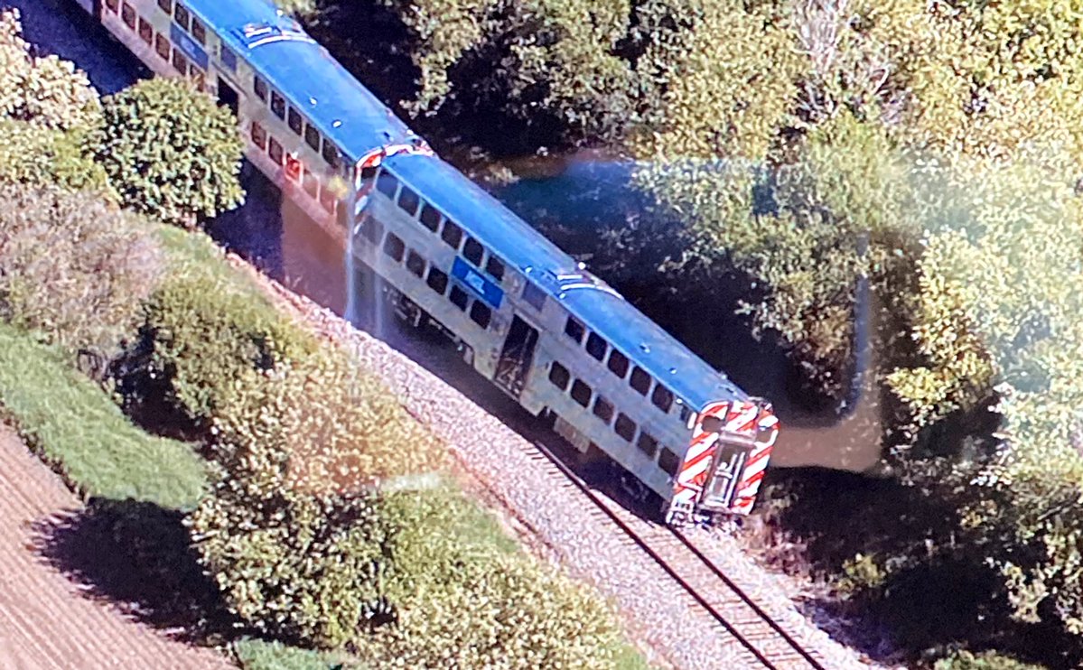 Hainesville - fatal crash involving a Metra train & a truck at Antioch St just south of Belvidere Rd. The first car on the train derailed. Truck cab was completely destroyed. The truck driver did not survive. 