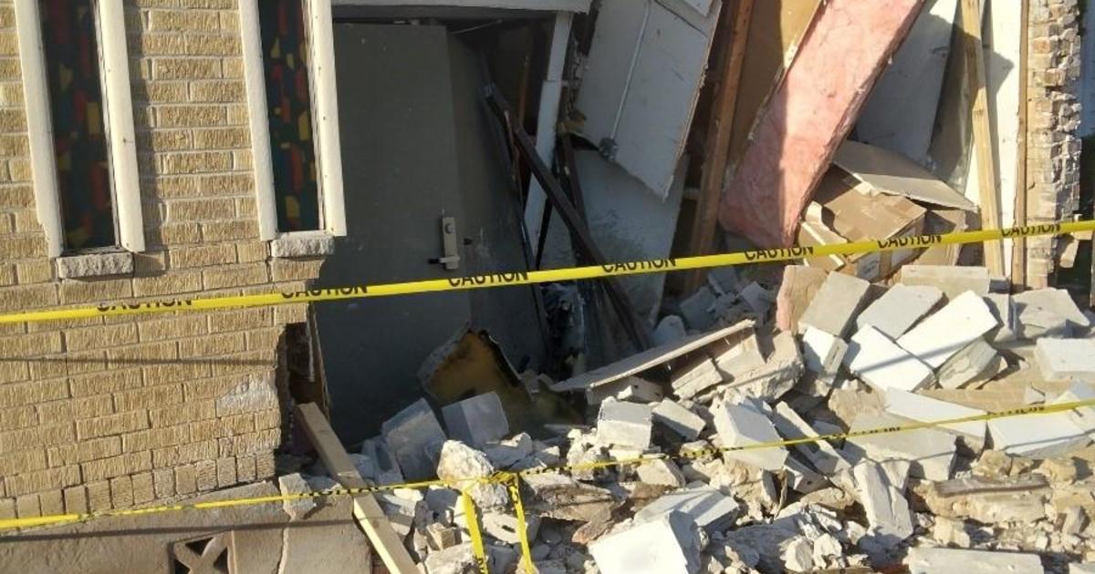 Person hospitalized after car crashes into building in Washington Heights