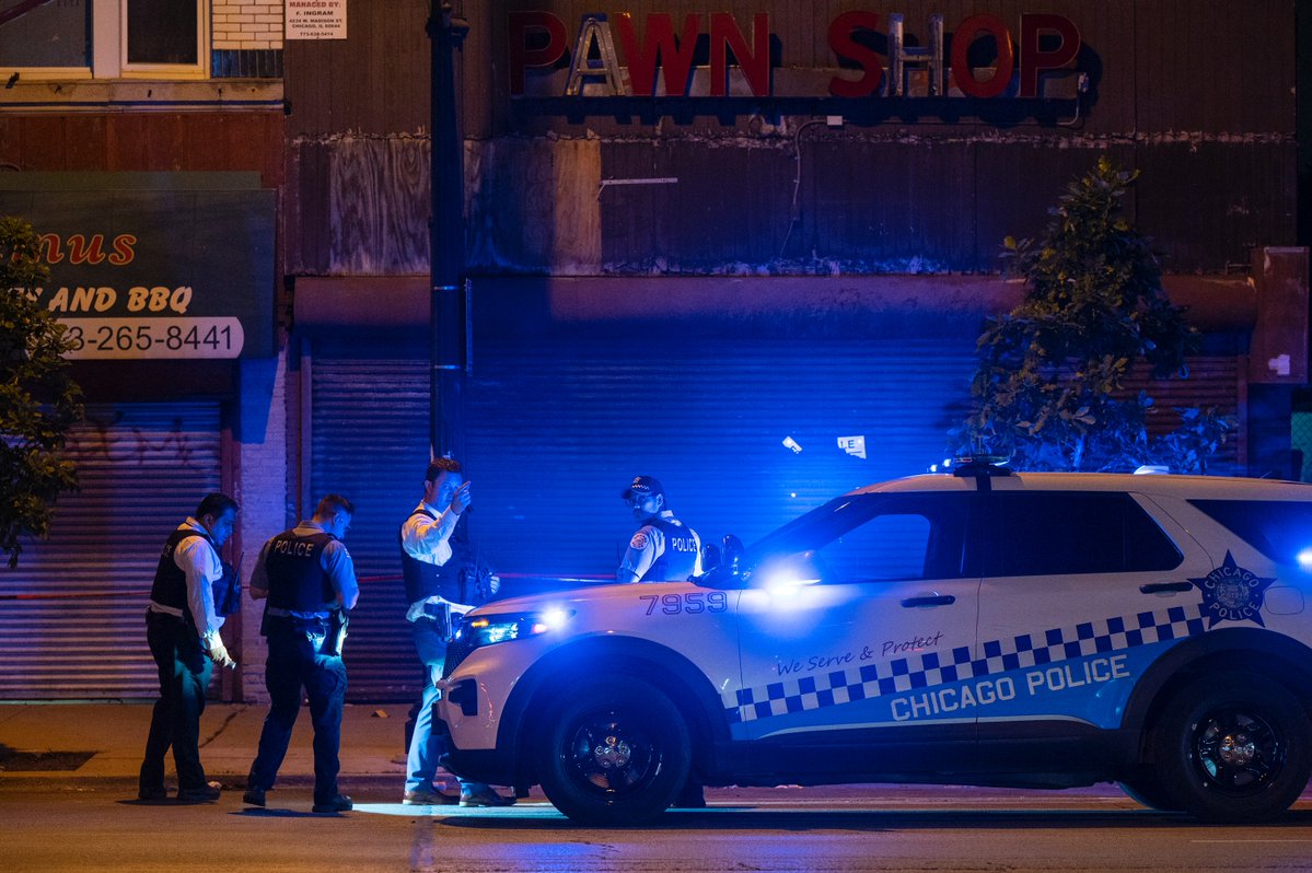 PHOTOS: Chicago police work the scene where a person was shot, in the 4200 block of West Madison Street, in the West Garfield Park neighborhood, Sunday, June 12, 2022.