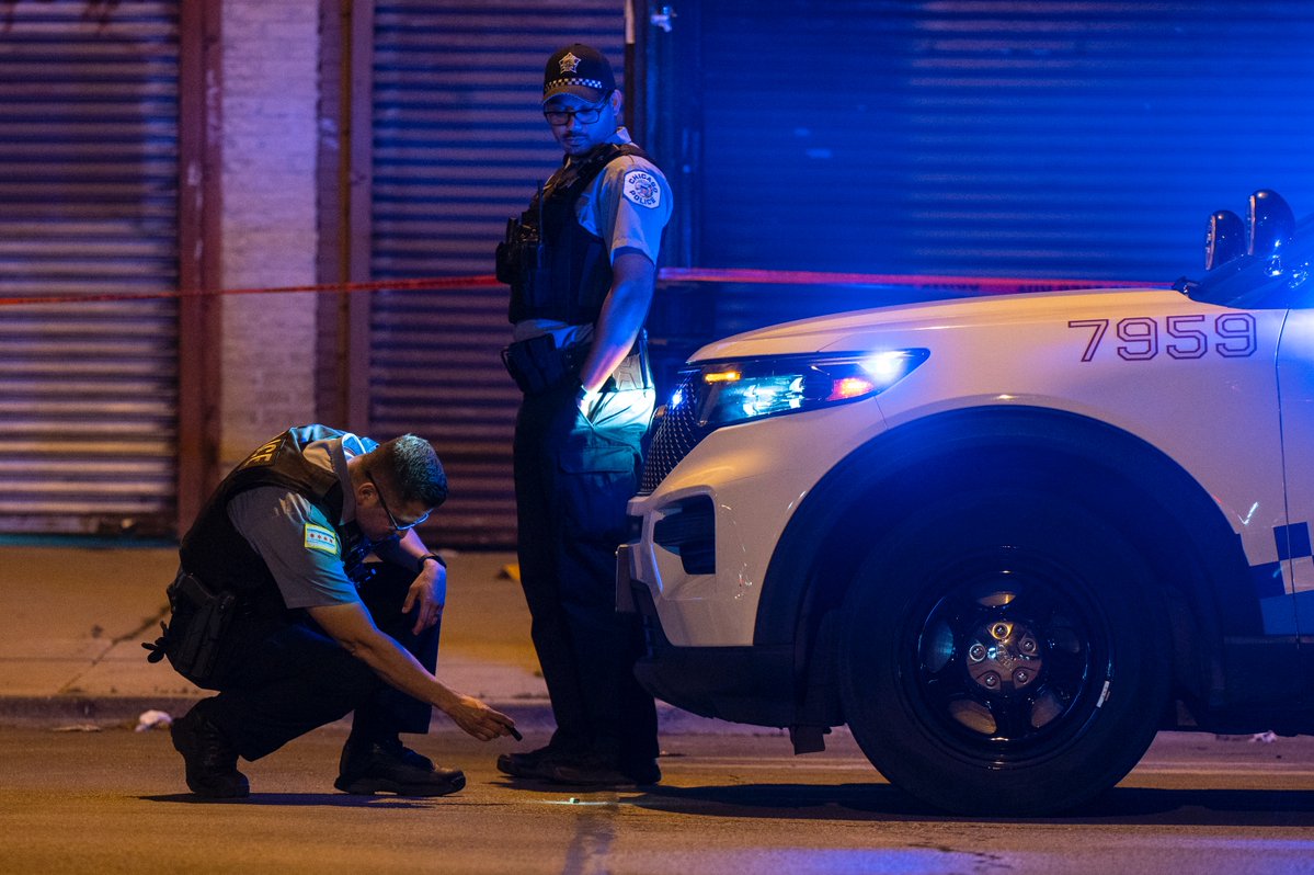 PHOTOS: Chicago police work the scene where a person was shot, in the 4200 block of West Madison Street, in the West Garfield Park neighborhood, Sunday, June 12, 2022.