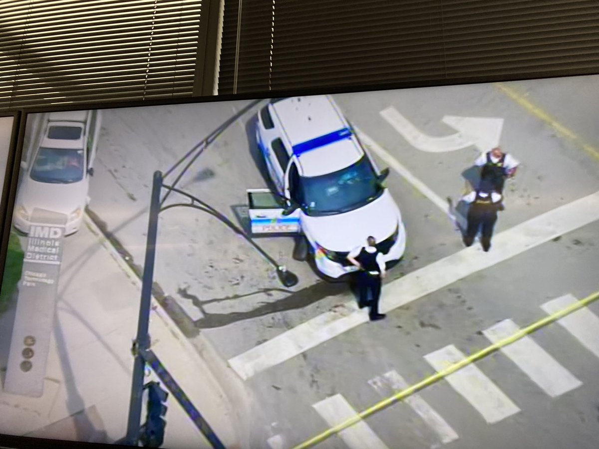 Call of officer down here @ Jackson & Kostner . This is the debris from the scene where someone stole a police cruiser. Officer — according to police radio — sustained lacerations to face.  Cruiser and suspect later crashed at Damon and Harrison 