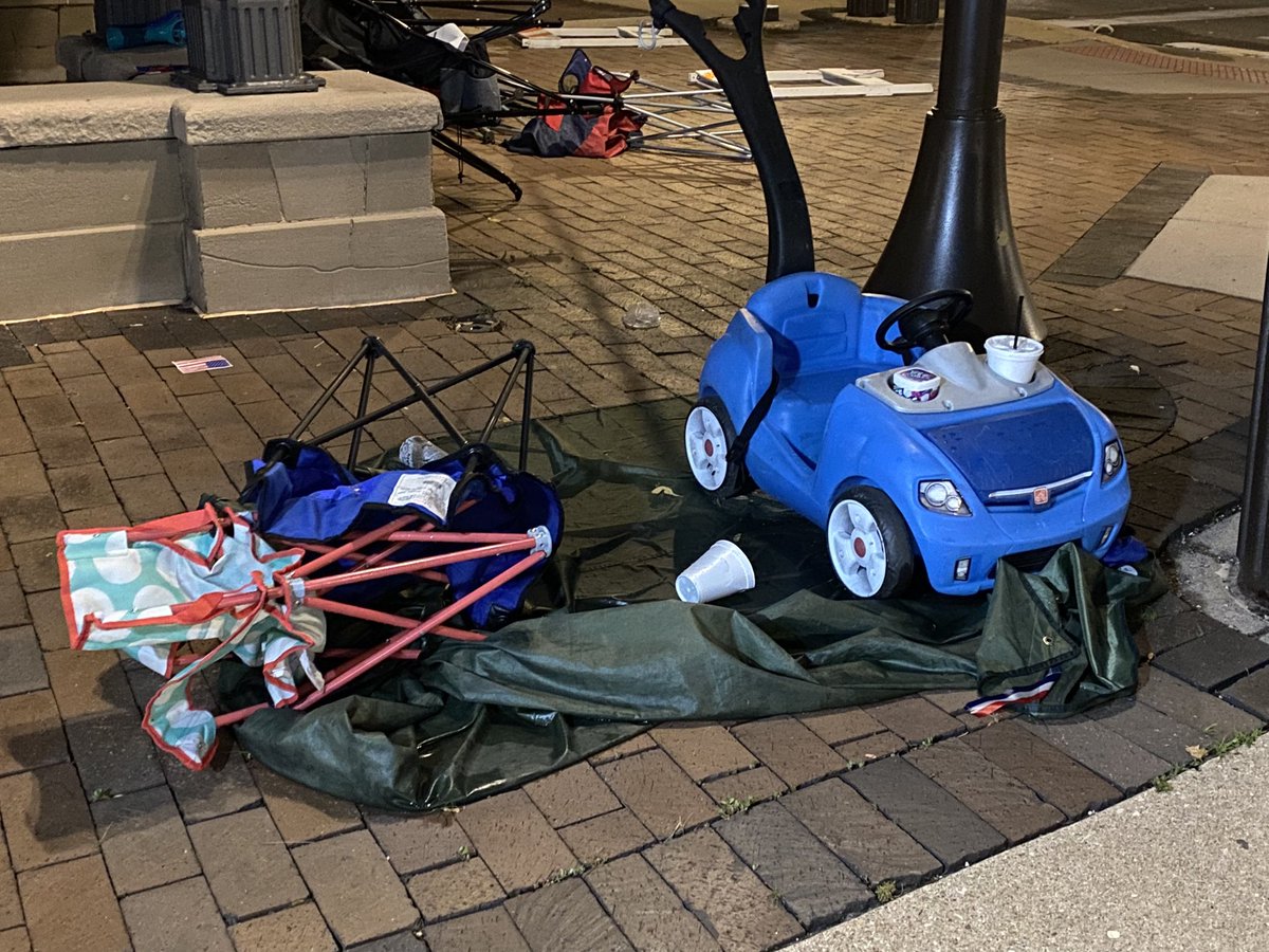 Quite an eerie scene here in Highland Park this morning.   Police still have the crime scene from yesterday's shooting taped off, and peoples belongings still line the parade route after storms rolled through overnight.   Suspect Bobby Crimo was taken into custody last night