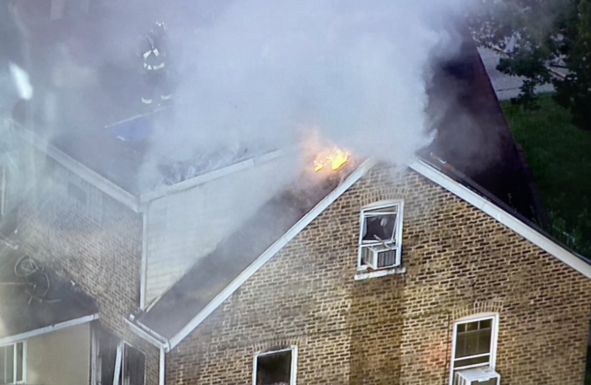 Broadview NorthRiverside Brookfield working on a house fire at 19th Ave & 13th St. Flames coming up through the roof now