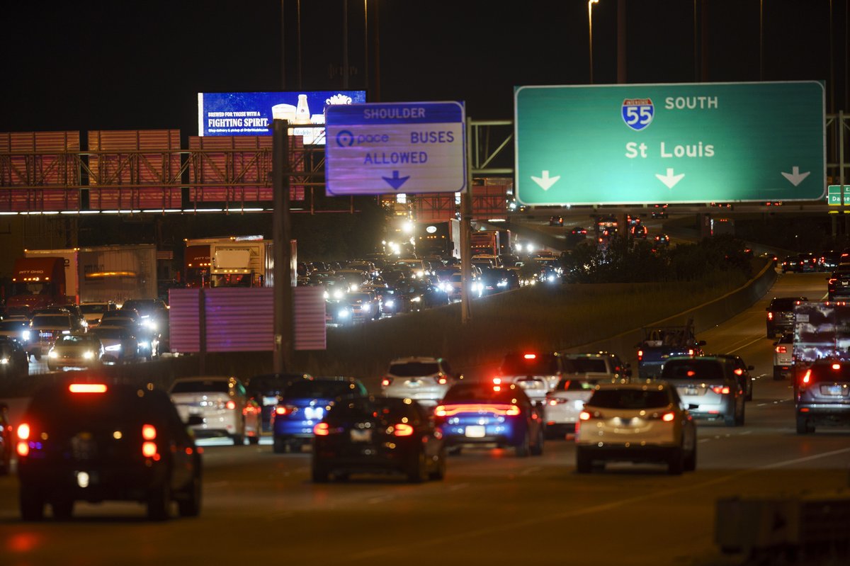 Officers work the scene of a shooting on the inbound lanes of the Stevenson Expressway near the Dan Ryan Expressway entrance ramp Thursday in Chicago