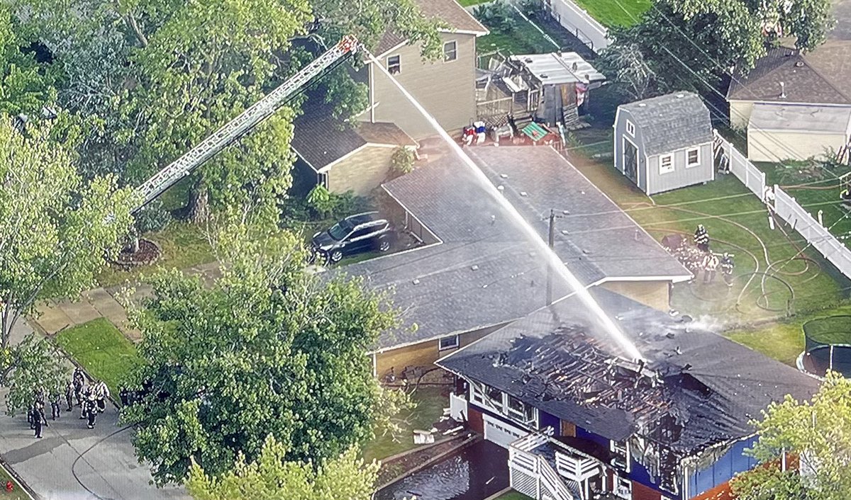 Fire suppression from an aerial device has been the most effective way to fight a fire where a potential barricade situation exists. Firefighters remain in protected positions, unable to advance until officers clear the interior. We are watching at