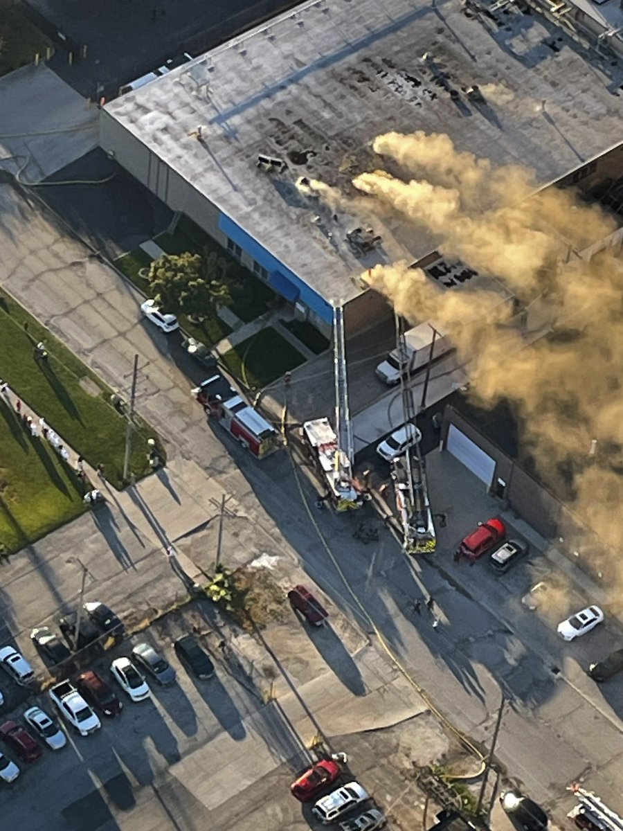 Smoke pushes out of open roof scuttles and one vent hole cut by the FD, during a blaze at the Tasty Bread factory on Fullerton at 25th Avenue in Franklin Park. No word of any injuries at this time. All FD companies are working 