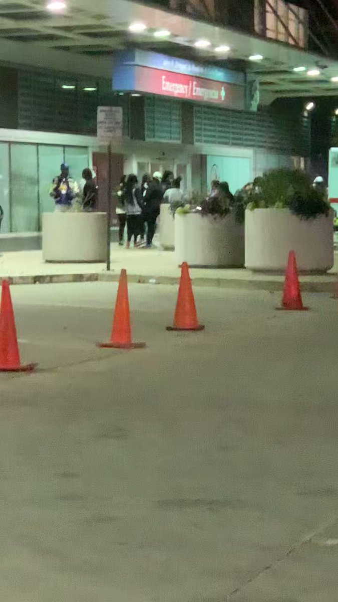 October 21, 2022. Family members gather outside of Stroger Hospital after a 12-year-old boy was shot in the 900 block of South Albany, North Lawndale neighborhood, West Side. The was a drive-by shooting. Prayers and well wishes are needed