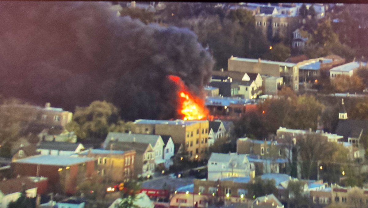 LoganSquare - 2 Alarm Fire at Washtenaw near Fullerton. 3 homes are on fire & they're worried about it spreading to a 4th home. Massive flames &amp; smoke. Washtenaw is closed Fullerton to Altgeld. Fullerton is blocked between California and Talman