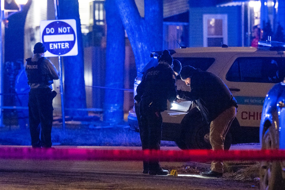 Chicago police work the scene where a 14-year-old girl was critically wounded in a shooting in the 2900 block of East 97th Street in Jeffery Manor neighborhood in Chicago's Southeast Side, Thursday, Jan. 5, 2023. Chicago 