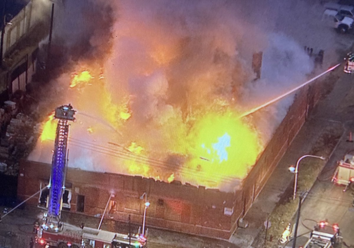 WestGarfieldPark - 2 Alarm fire continues to rage through the entire roof & building at Kenton &amp; Fulton. No injuries reported. Equipment blocks Lake St, Kenton, &amp; Fulton in the area