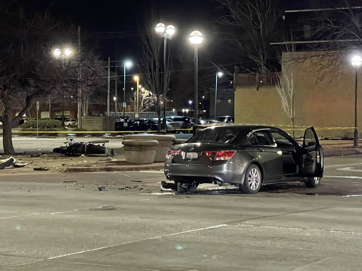 Police and other emergency responders are on the scene of a crash involving a vehicle in a motorcycle in the area of 17th St. and River Drive, Moline