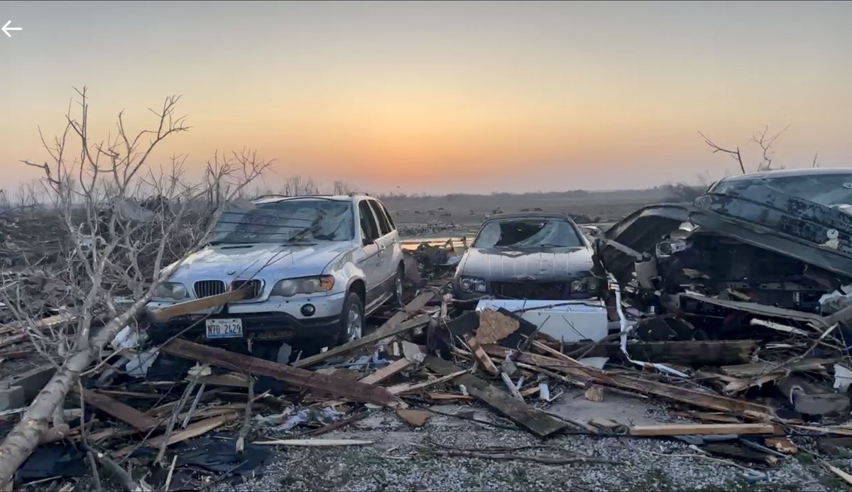 The sunrise revealing extensive damage in Robinson, Illinois from a tornado