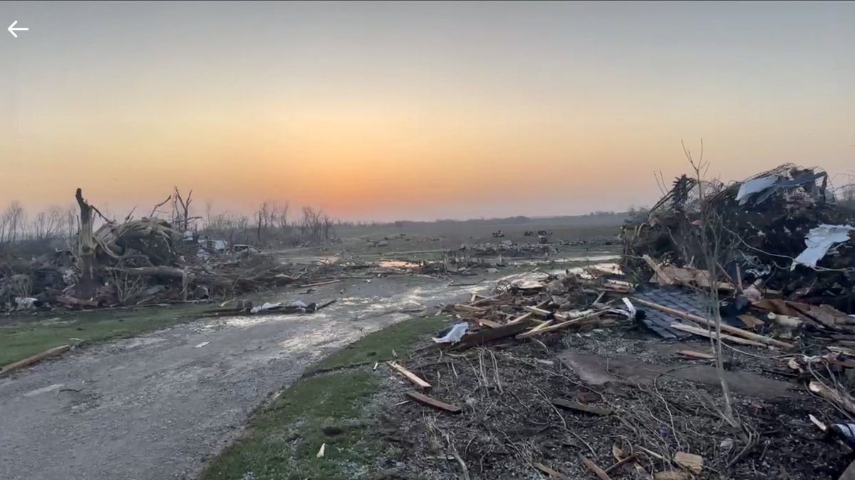 The sunrise revealing extensive damage in Robinson, Illinois from a tornado