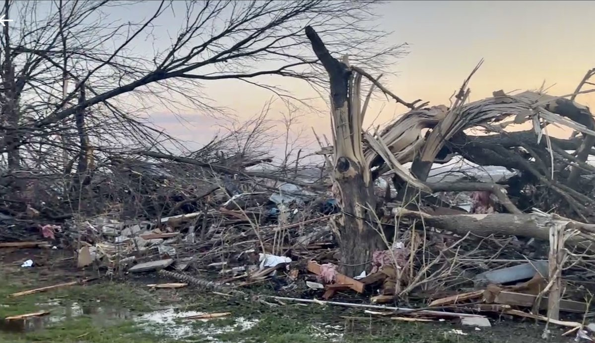 The sunrise revealing extensive damage in Robinson, Illinois from a tornado