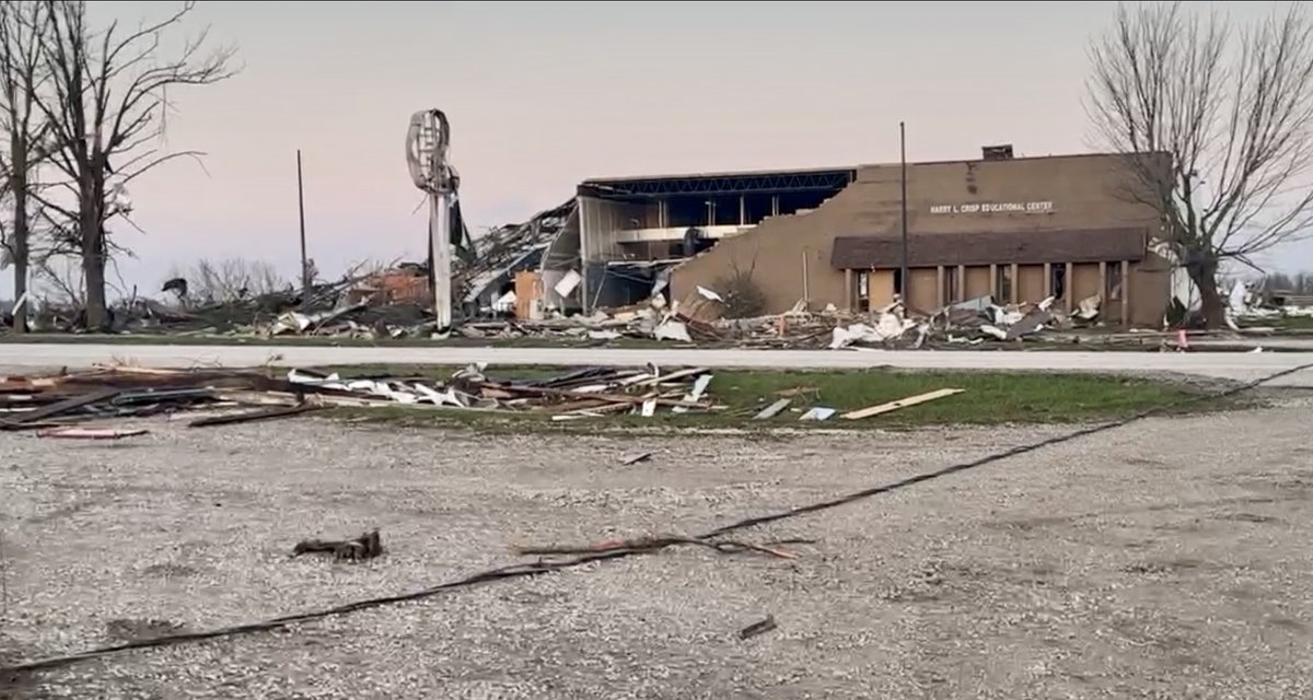 The sunrise revealing extensive damage in Robinson, Illinois from a tornado