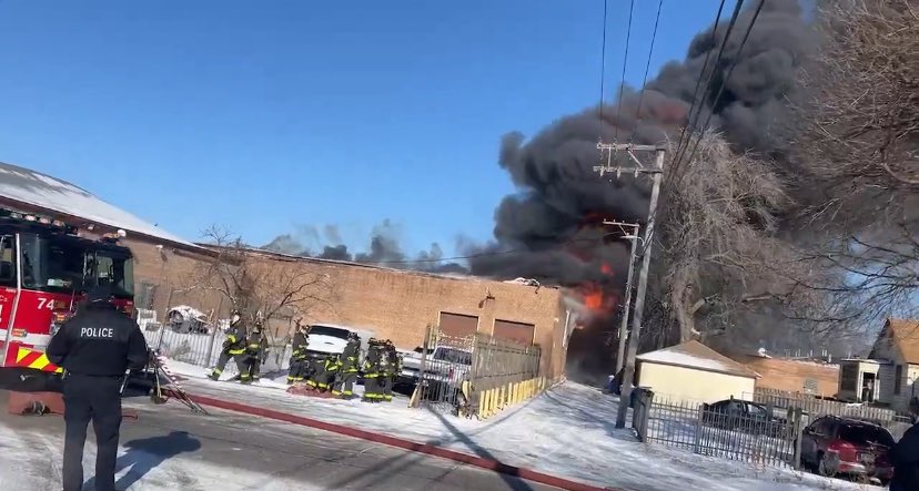 2-11 Alarm 10259 S Ave O Chicago, IL. Heavy fire thru roof 100x200 1 story commercial. 