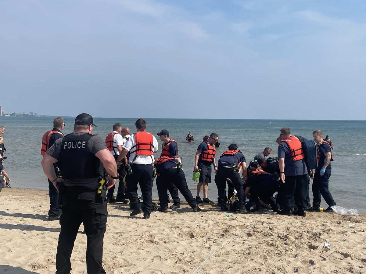 Person in water Montrose beach.  One person made it to shore.  One person under water CFD helicopter spotted victim and dropped divers. Person rescued. CPR in progress on way to Weiss hospital critical