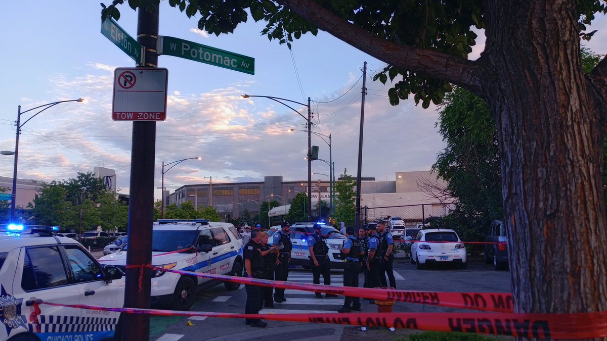 Shooting at migrant shelter on 1300 North Elston so far when shooting victim listing them as a John Doe probably a migrant   on-the-spot reporting  chicago migrants crime