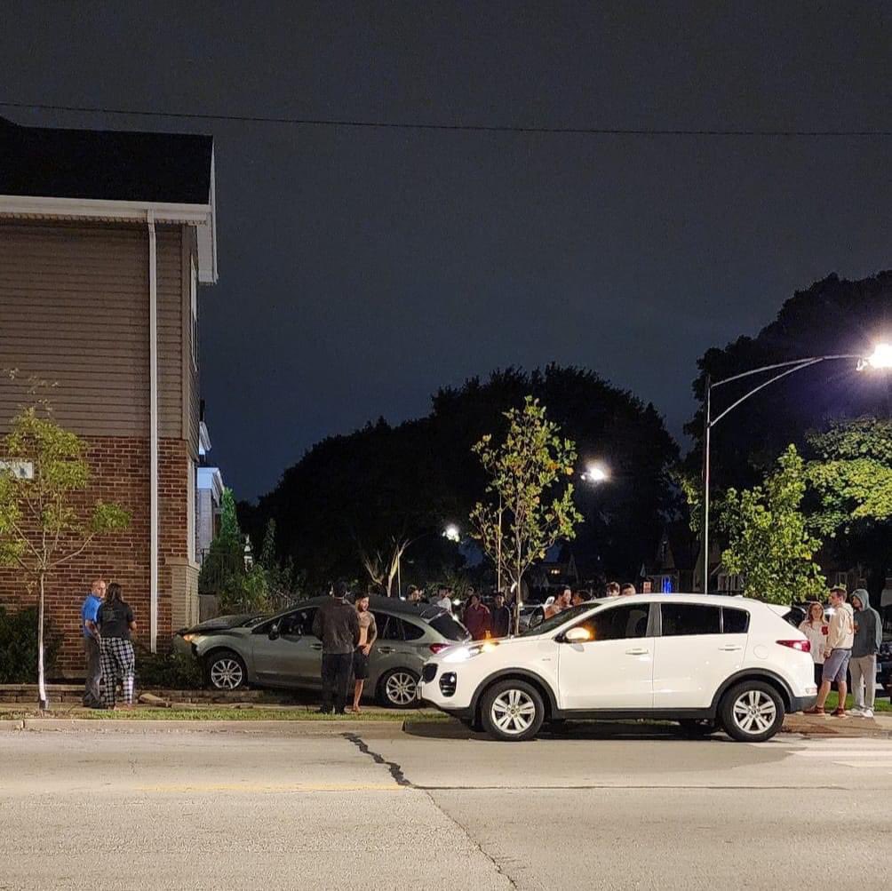 Shooting involved accident - wrong way down 3400 & 3500 Oconto, crash into side of building at Addison & Oconto. . 2nd pic is police where shots were fired. 3rd is fire & ambo where cars are. 