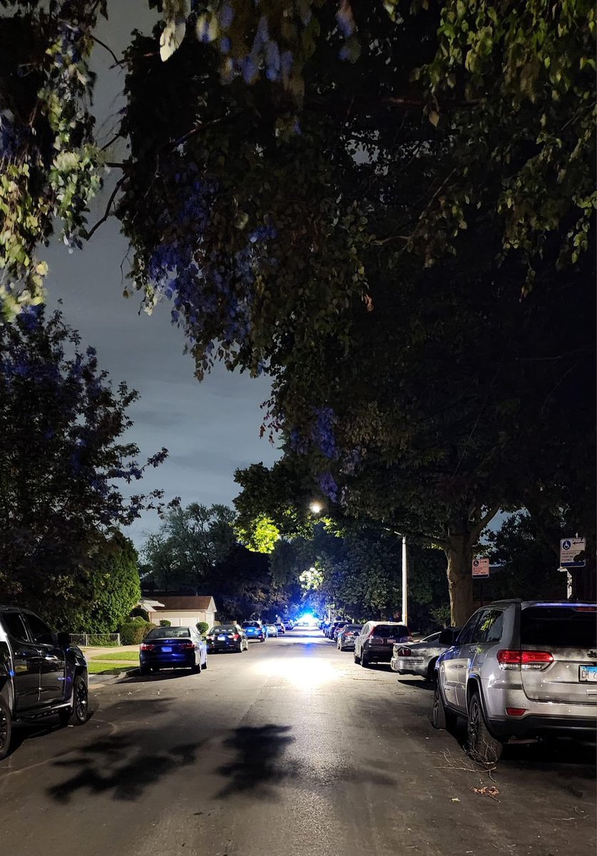 Shooting involved accident - wrong way down 3400 & 3500 Oconto, crash into side of building at Addison & Oconto. . 2nd pic is police where shots were fired. 3rd is fire & ambo where cars are. 