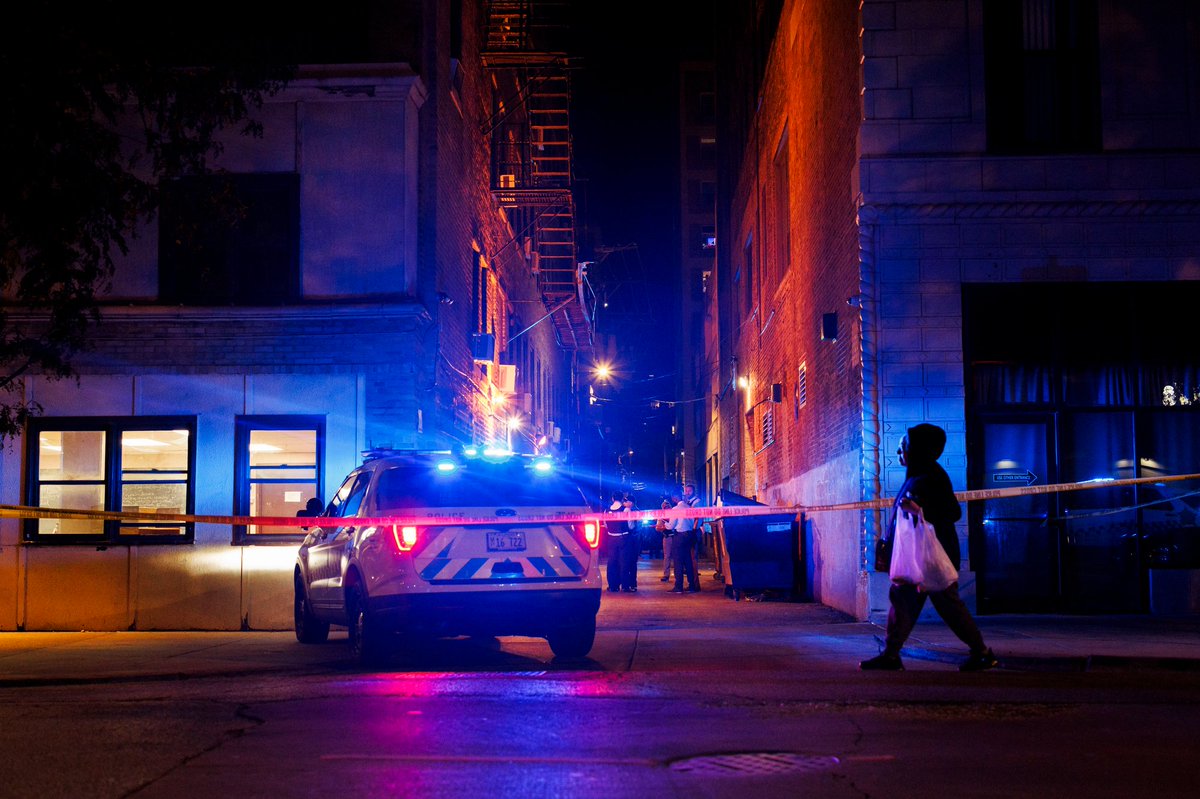 Officers work the scene where a man was fatally shot in the leg near the intersection of West Wilson avenue and North Sheridan Road in the Uptown neighborhood Tuesday evening in Chicago