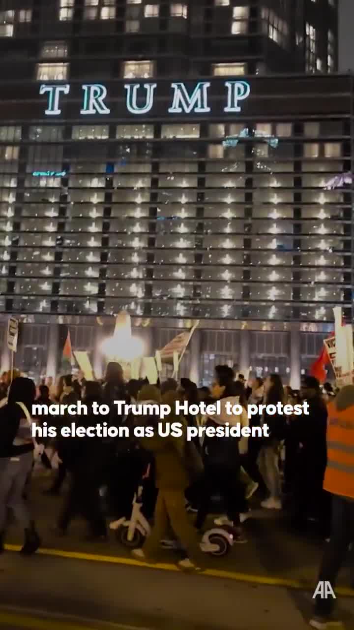 Hundreds of demonstrators are protesting against Donald Trump's election as US president, gathering at Chicago's Federal Plaza and marching to the Trump Hotel•  Among those marching were those carrying Palestinian and Lebanese flags to show their support