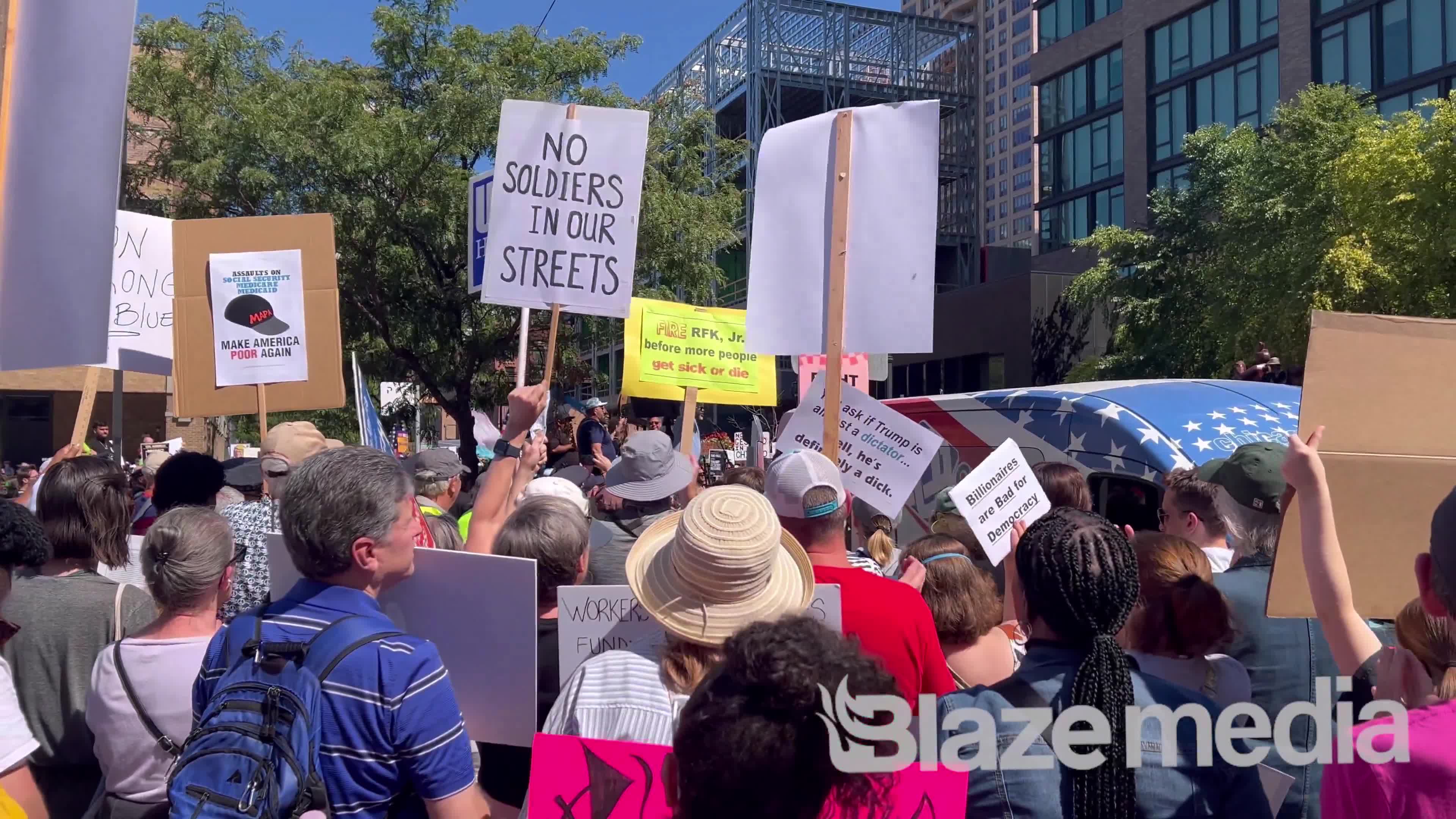 Chicago mayor Brandon Johnson holds rally to protest Trump’s safety measures as dozens were shot this weekend