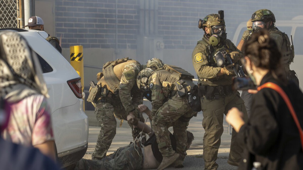 Federal agents clashed with protesters outside a Chicago-area ICE facility, leading to arrests, injuries, and use of tear gas amid a deportation surge. (Photo by: Zubaer Khan/AP)