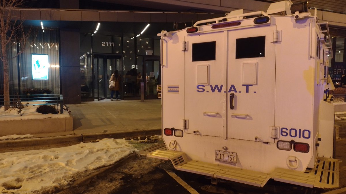 SWAT . 2111 S. Wabash. it was reported over dispatch that person lost his job, drinking and doing drugs threatening to commit suicide report is he has a draco: texting his family and there were reports all day of him having issues
